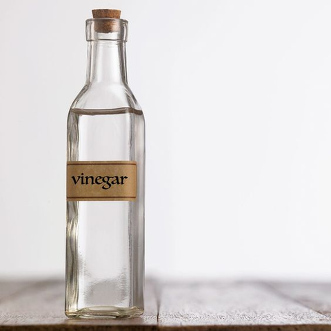 Vinegar helps break down grease and grime.