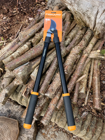 Loppers are long-handled pruning tools for trimming trees, shrubs, and larger plants in the garden