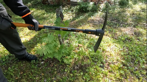 Mattock is a versatile gardening tool for heavy-duty tasks such as trenching, digging holes, and removing roots