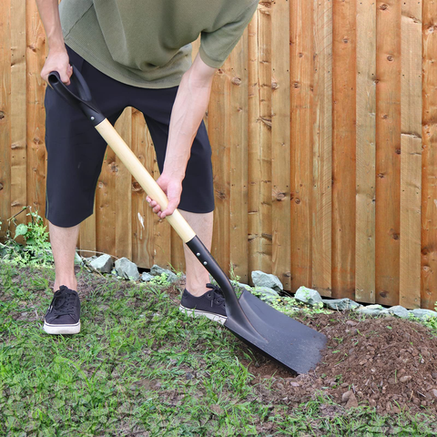 A flat head shovel, also known as a square head shovel, features a flat, square-shaped blade, ideal for scooping and moving materials such as soil, sand, or gravel with ease