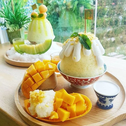 Kakigori, shaved ice dessert topped with colorful syrups, brings cooling relief during summer