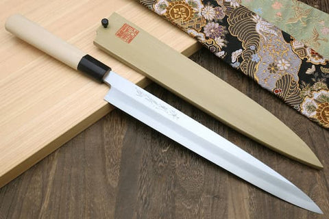 The tang is typically thicker than the edge and runs from the handle to the tip of the blade.