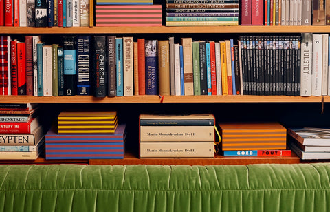 tidy bookcases with storage boxes helping to ensure a spring clean tidy feeling