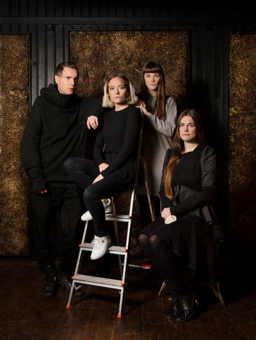 the artistic board of Fischersund are stood in a dark wood room, including siblings Jónsi of Sigur Ros fame, Lilja, Sigurrós and Inga Birgis, along with Sindri and Kjartan Holm