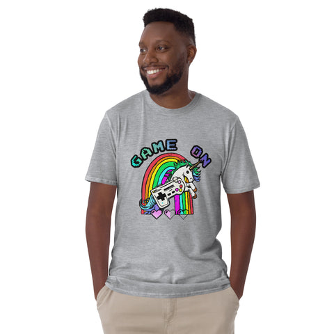 A young man wearing a Real Unicorn Apparel "Game On" graphic tee of a unicorn with a video game controller.