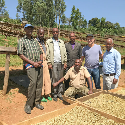 Mark Smutek with group of farmers