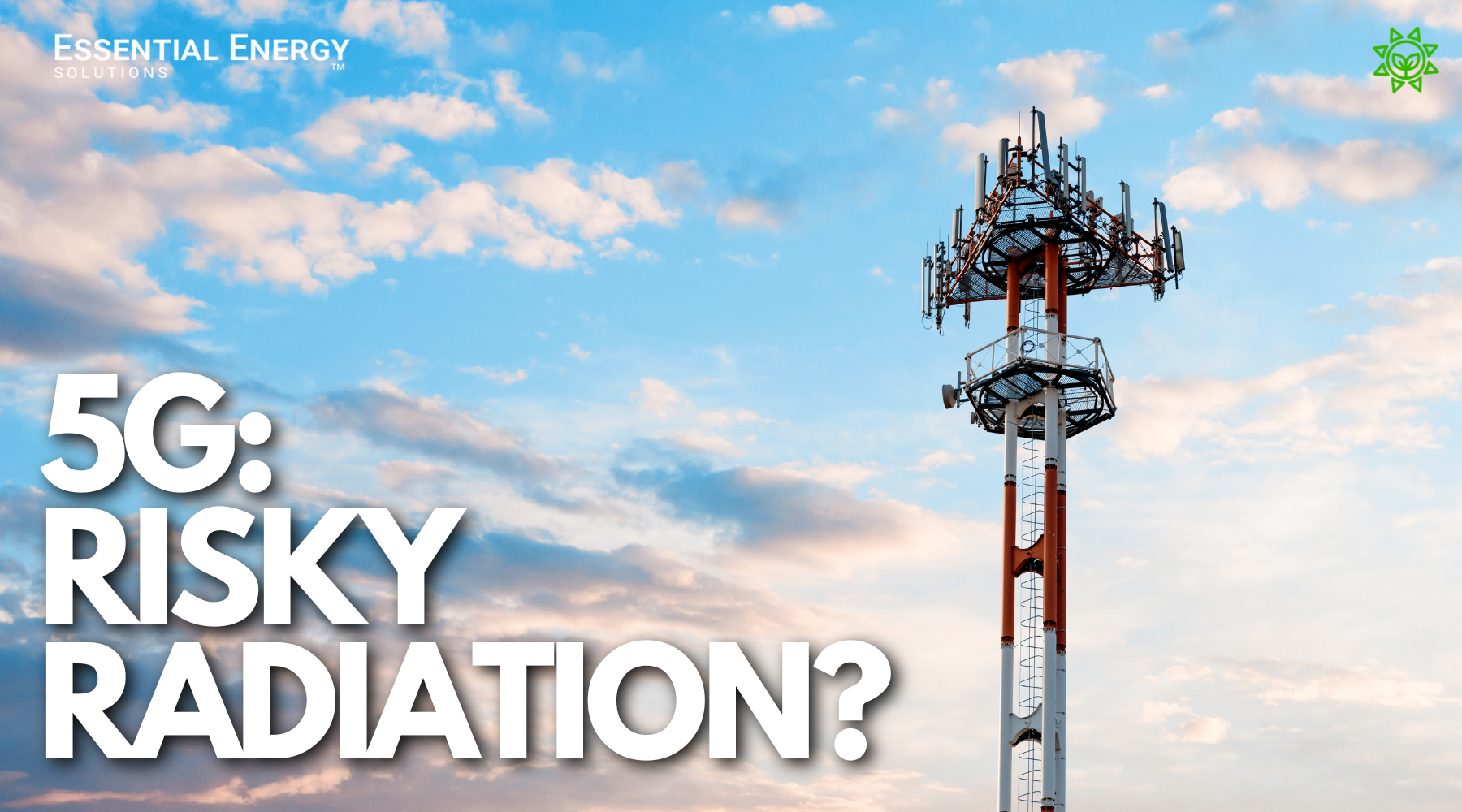 A cell phone tower with many antennas attached to it stands in a field of green grass under a clear blue sky with white clouds. The text "Essential Energy" is written in white letters on a blue rectangle in the lower left corner of the image. The text "SOLUTIONS 5G: RISKY RADIATION?" is written in white letters on a red rectangle in the lower right corner of the image.