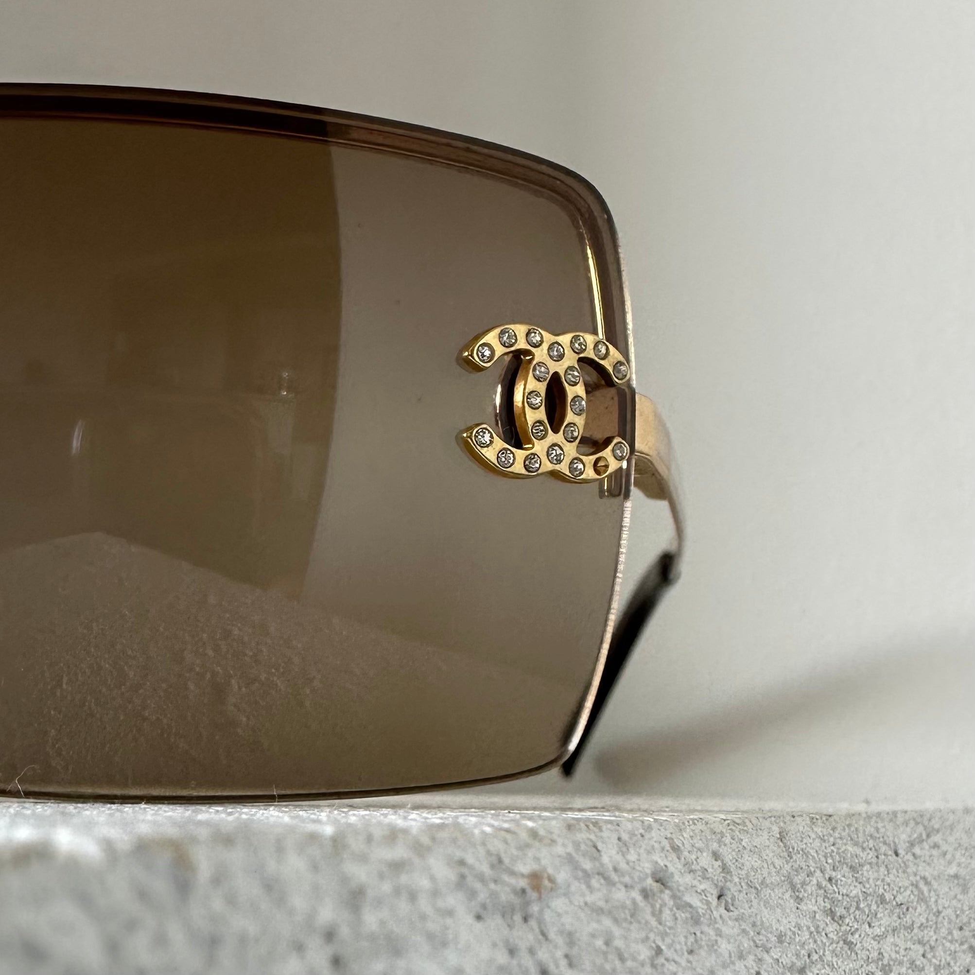 NTWRK - Chanel Brown and Gold Rimless Sunglasses