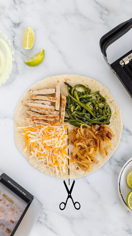 tortilla laying flat with cheese, chicken, onion, and peppers in four quads of the tortilla. 