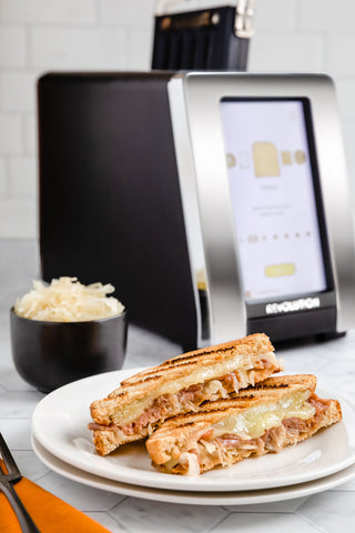 A Taste of Bavaria: German-inspired Grilled Cheese with ham, Swiss, and sauerkraut