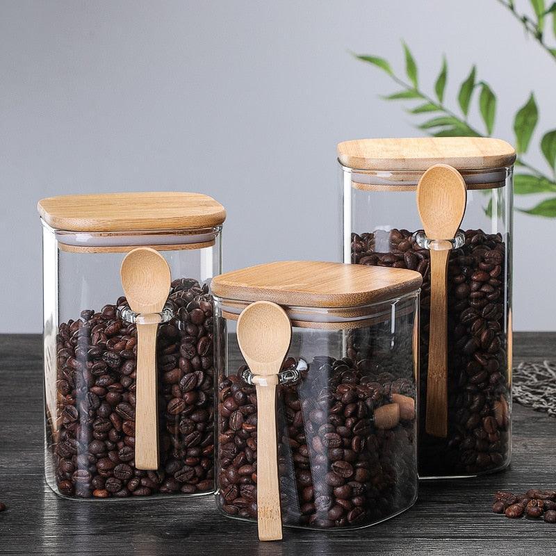 https://cdn.shopify.com/s/files/1/0564/6935/6723/products/3-ideas-storage-tank-800-1200ml-with-spoon-sealed-jar-condiment-coffee-beans-tank-kitchen-supplies-sugar-storage-bottle-tea-box-pocoro-1.jpg?v=1677673062&width=900