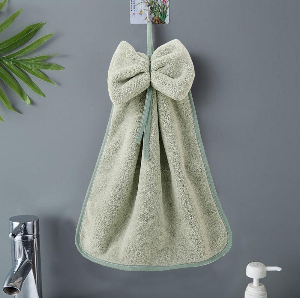 https://cdn.shopify.com/s/files/1/0564/6935/6723/products/bathroom-microfiber-soft-hanging-loops-quick-dry-absorbent-cloths-home-terry-towels-bowknot-coral-velvet-hand-towel-for-kitchen-pocoro-2.jpg?v=1677671485&width=1000
