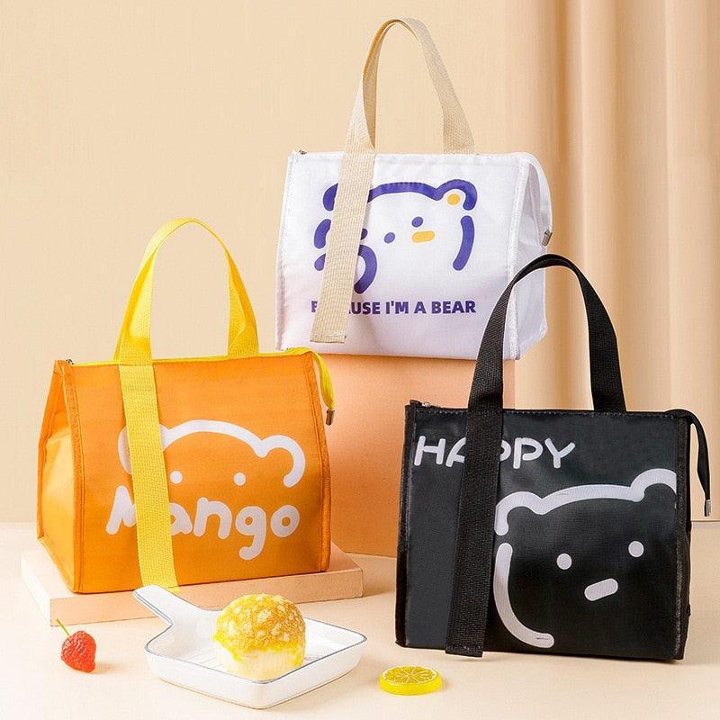 https://cdn.shopify.com/s/files/1/0564/6935/6723/products/food-storage-handbags-cartoon-portable-thermal-lunch-box-bags-for-women-kids-travel-picnic-pouch-insulated-cooler-bento-bag-pocoro-1.jpg?v=1677666561&width=900