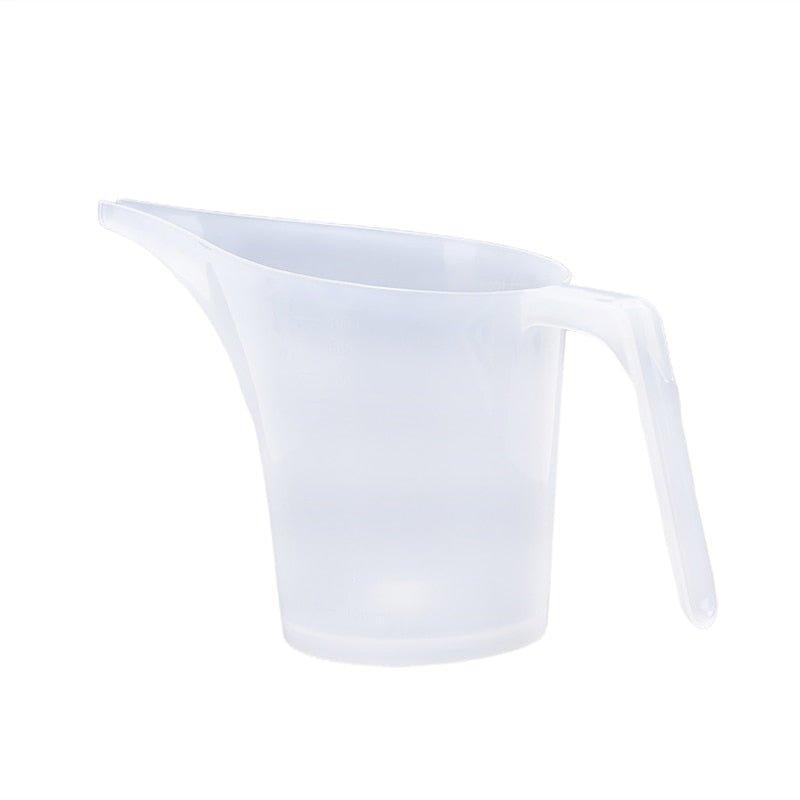 https://cdn.shopify.com/s/files/1/0564/6935/6723/products/measuring-cup-with-long-spout-that-can-also-be-used-as-a-jug-pocoro-2.jpg?v=1677648105&width=1000