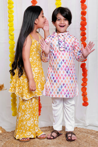 Elegant top and sharara set for girls with an A-line kurta pyjama set for boys