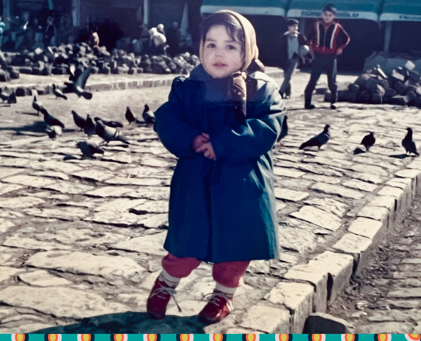 ayca as a child wearing scarf