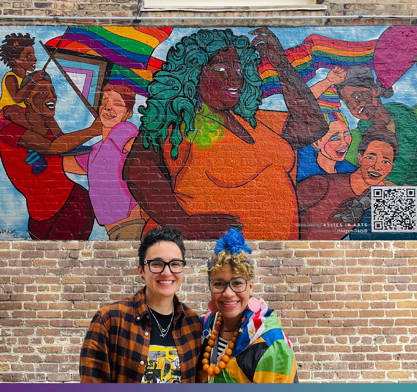 Pride mural in Chicago designed by artist Sam Kirk and her wife, Jenny Q,