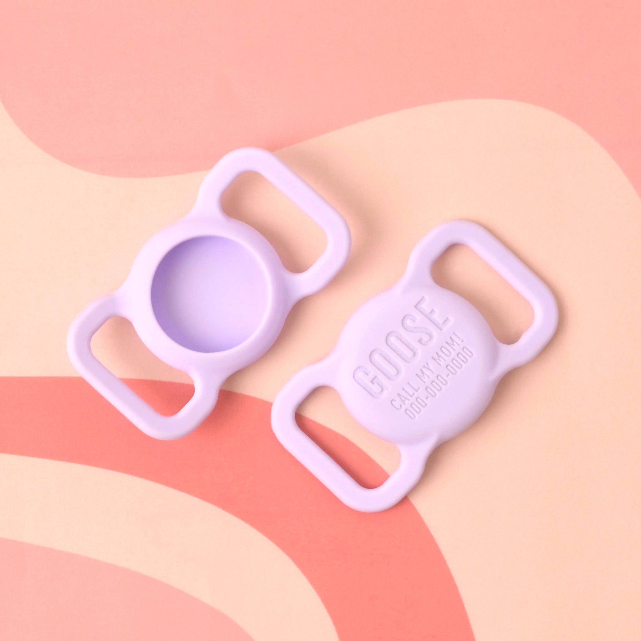 AirTag Holders on pink background