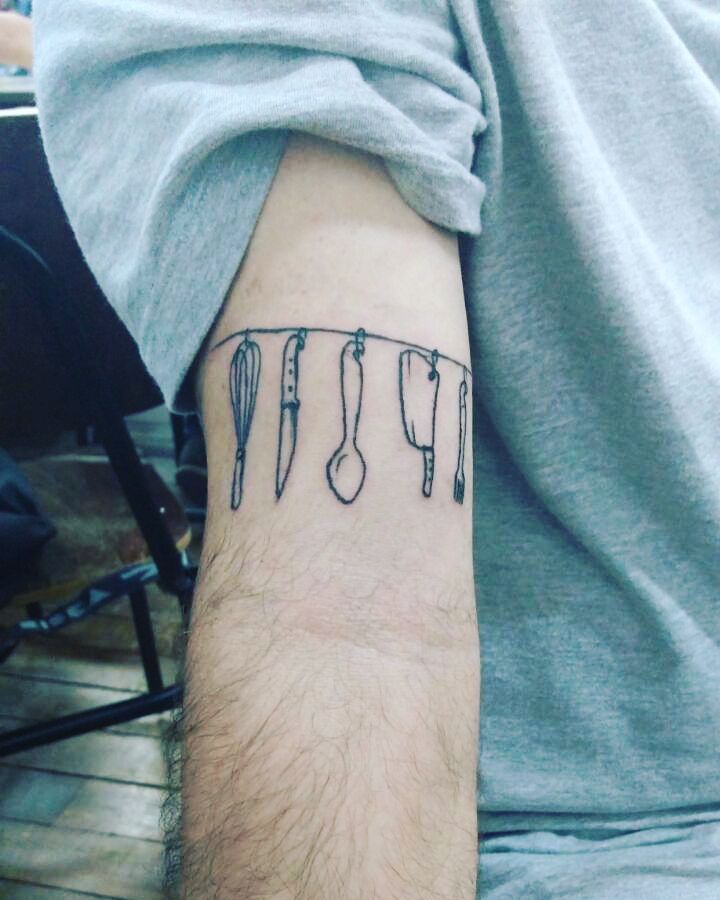 Tiny Knife With Fork Silhouette Tattoo On Forearm