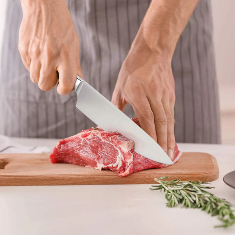 Cut meat with a chef knife