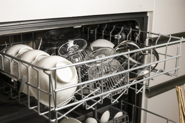 Clean dishes and cups in the dishwasher