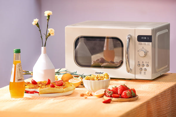 a retro microwave on the table