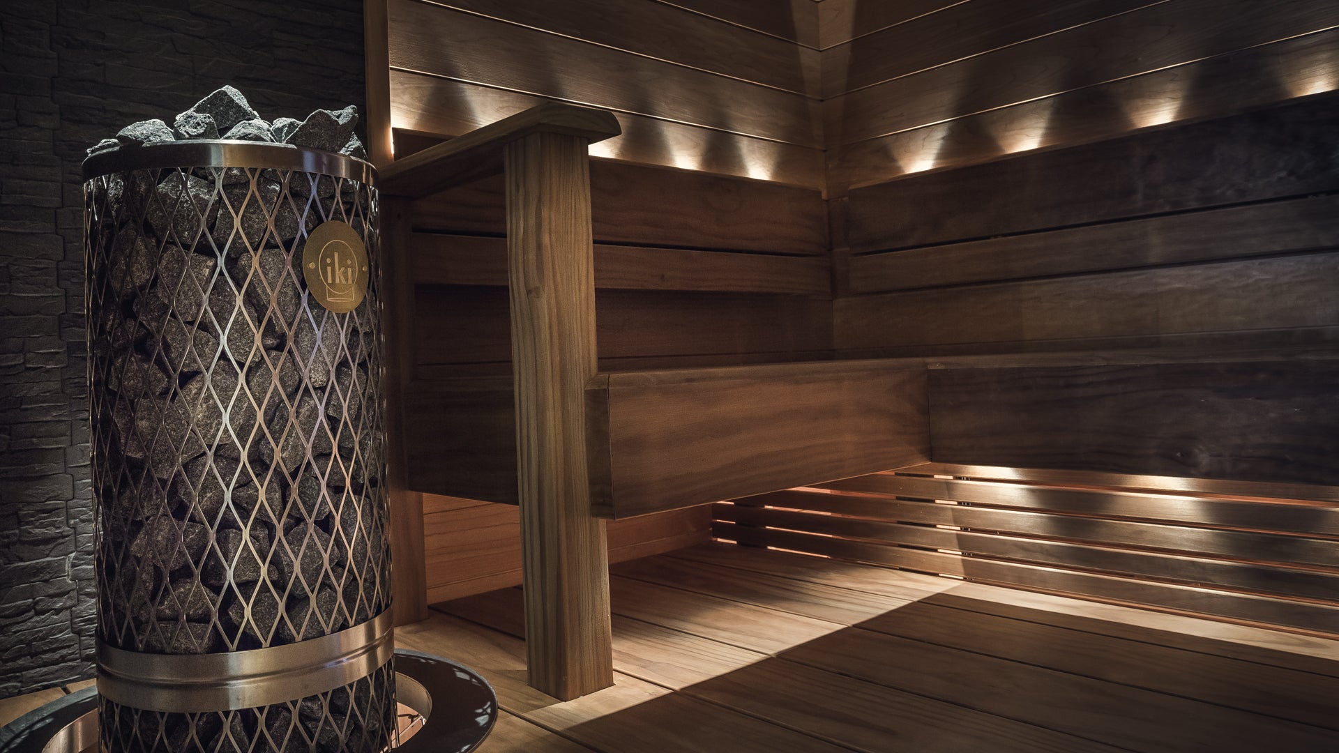 Cariitti sauna lights with an IKI Pillar electric heater