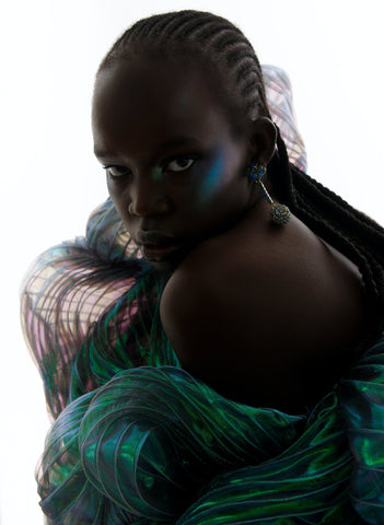 Dark skin model in statement piece