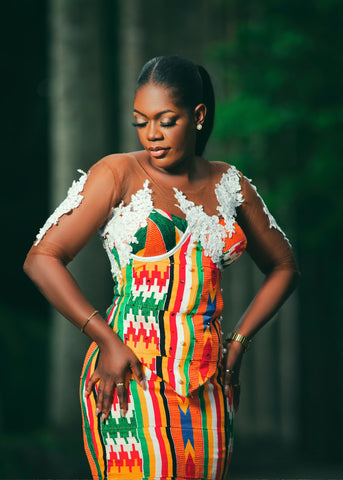 Woman in Kente Clothing