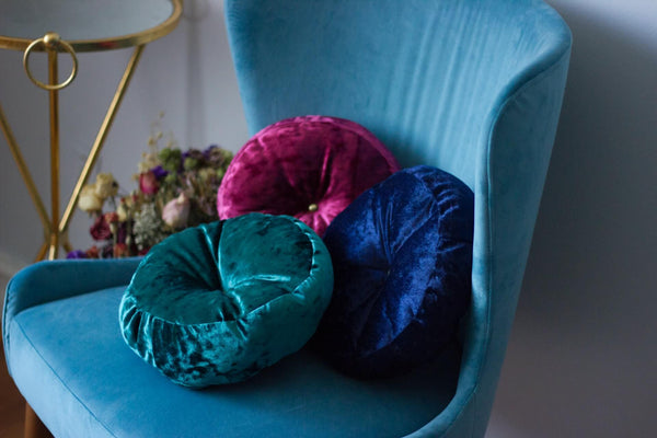 Velvet cushions on chair