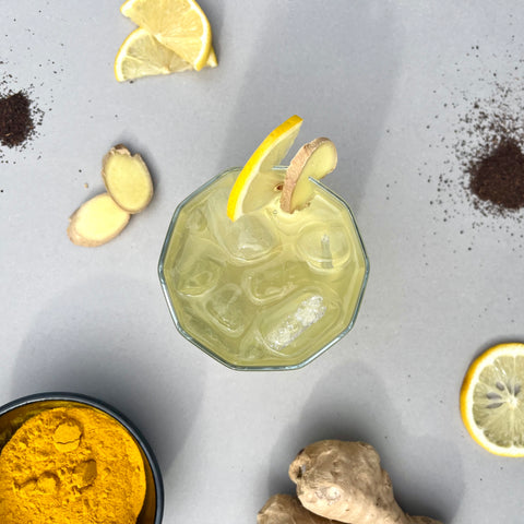 King Bee The Father spiced rum, with manuka, lemon and turmeric sparkling iced tea