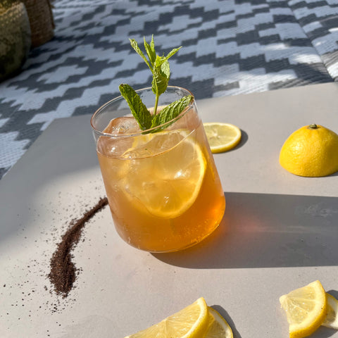 The Classic Wife Gin Cocktail with lemon iced tea and fresh mint