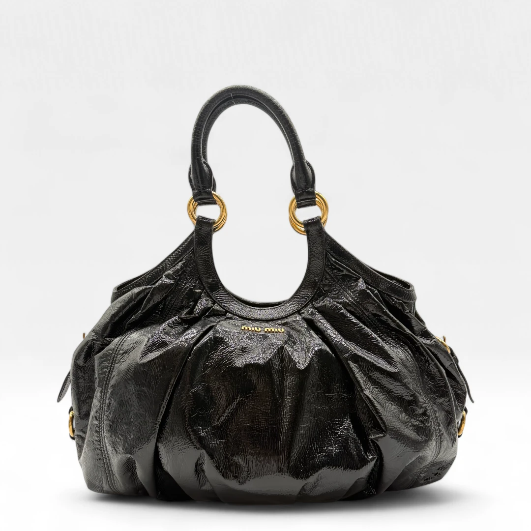 image of Miu Miu Handtasche Croissant Form