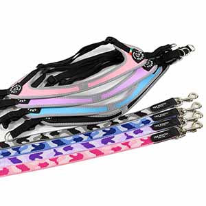 Selection of Tre Ponti Genesis Adjustable Belly harnesses and Tre Ponti Camo Leashes in pink, purple, blue, and black