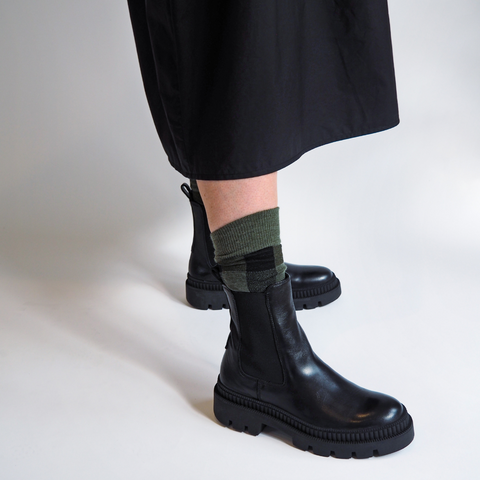 Ames Store - on tread black boots Swanndri socks and black dress