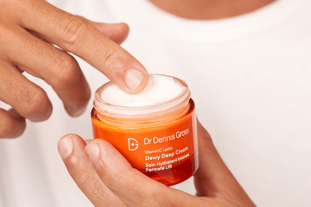 Man using Dr. Dennis Gross Vitamin C Lactic Dewy Deep Cream