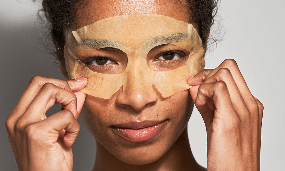 Woman wearing DermInfusions Lift Repair Eye Mask by Dr Dennis Gross Skincare