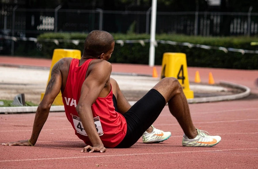 A tired runner unaware that genetic testing can improve recovery