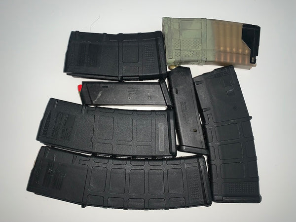 Pile of 5.56 and 9mm magazines.