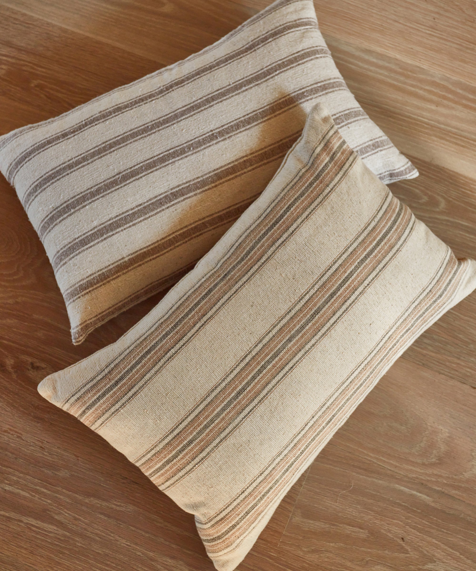 https://cdn.shopify.com/s/files/1/0565/1234/8333/products/mill-pillow-cocoa-stripe-3_fa213252-91f8-4447-ba18-2e530827dba2.jpg?v=1677610677