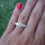 Close Up Hand Picture of Alani's Brian Gavin Graduated 5 Stone Trellis Ring