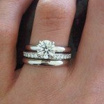 Hand Picture of Brian Gavin's Grace Solitaire and Wedding Bands