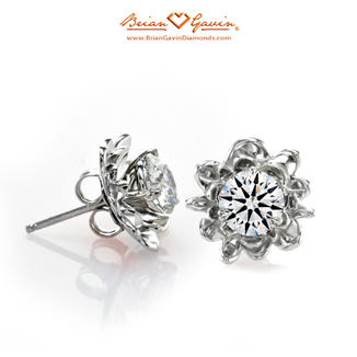 Diamond stud earrings with silver jacket in the shape of a flower