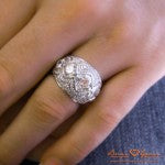 Hand Shot of 5 Stone Signature Cushion Cut Custom Ring by Brian Gavin