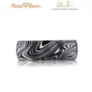 Damascus steel ring: Kona pattern, slightly rounded profile, black oxide finish, comfort fit interior