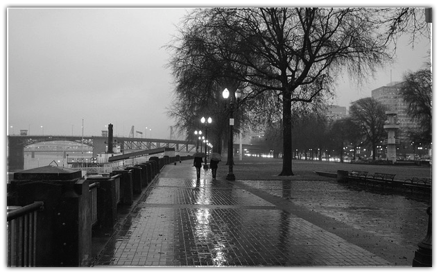 black and white image of Portland near the river
