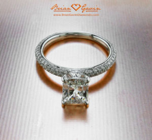 radiant cut diamond in pave engagement ring