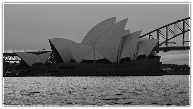 black and white photo of the iconic opera house in Sydney, Australia 