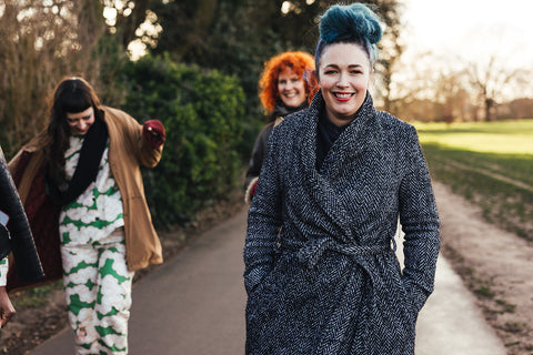 Group of women walking in their Wild Clouds clothing in the park