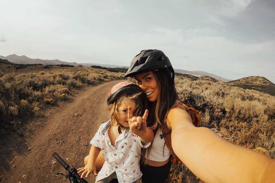 Mum and son mountain biking together